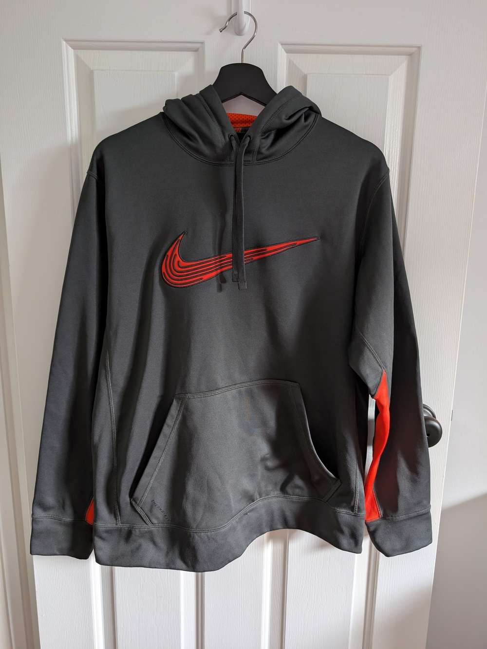 Nike Therma Fit Men’s Dark Gray Hoodie with Orange Swoosh Medium
